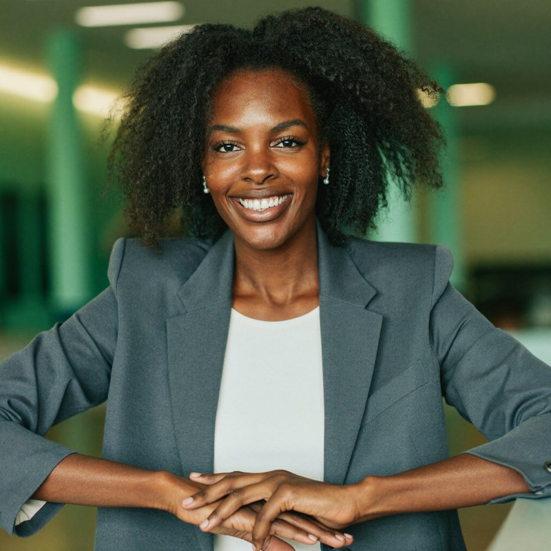 Black woman in a casual blazer, leading founder-led sales
